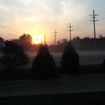 Fog hugs the ground as the sunrises on a cool morning in early October.